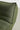 Close-up of the Greta XL Sleeper Sofa, a modern green fabric piece featuring a cushioned backrest and detailed stitching, set against a light gray background.