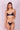 Model wearing a  Lonarc bikini set Black Nude.