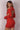 Back view of a model wearing a red dress from Lonarc