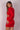 Back view of a model wearing a red dress from Lonarc
