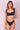 The model is wearing a Lonarc bikini set Black