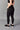 High Rise Side Pocket Recycled Core Compression 7/8 Legging in Matte Black by Wear Love More